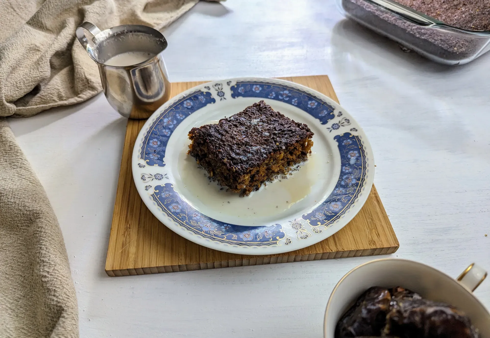 A piece of sticky date baked oats on a plate