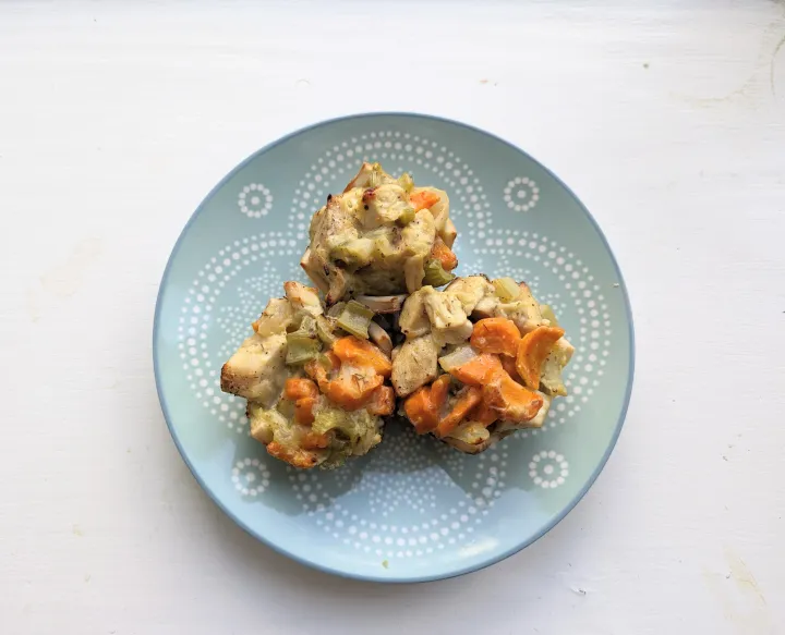 Three mini chicken pot pies on a plate